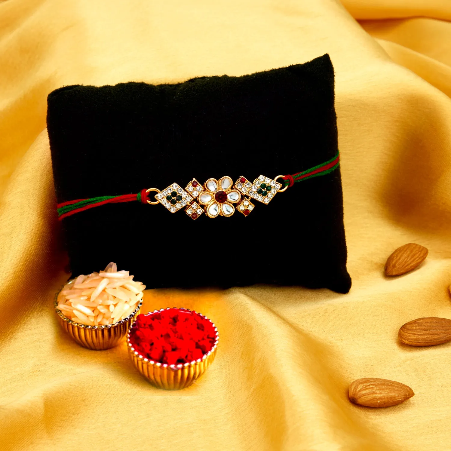 Sukkhi Awesome Gold Plated Floral Rakhi with Roli Chawal and Raksha Bandhan Greeting Card for Men